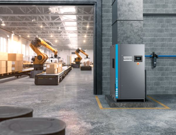 Atlas Copco GA 45 VSD FF industrial air compressor in an automated factory