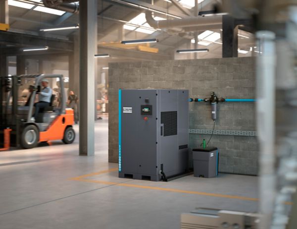 Atlas Copco GA 11-30 FLX oil-injected dual speed compressor in a warehouse